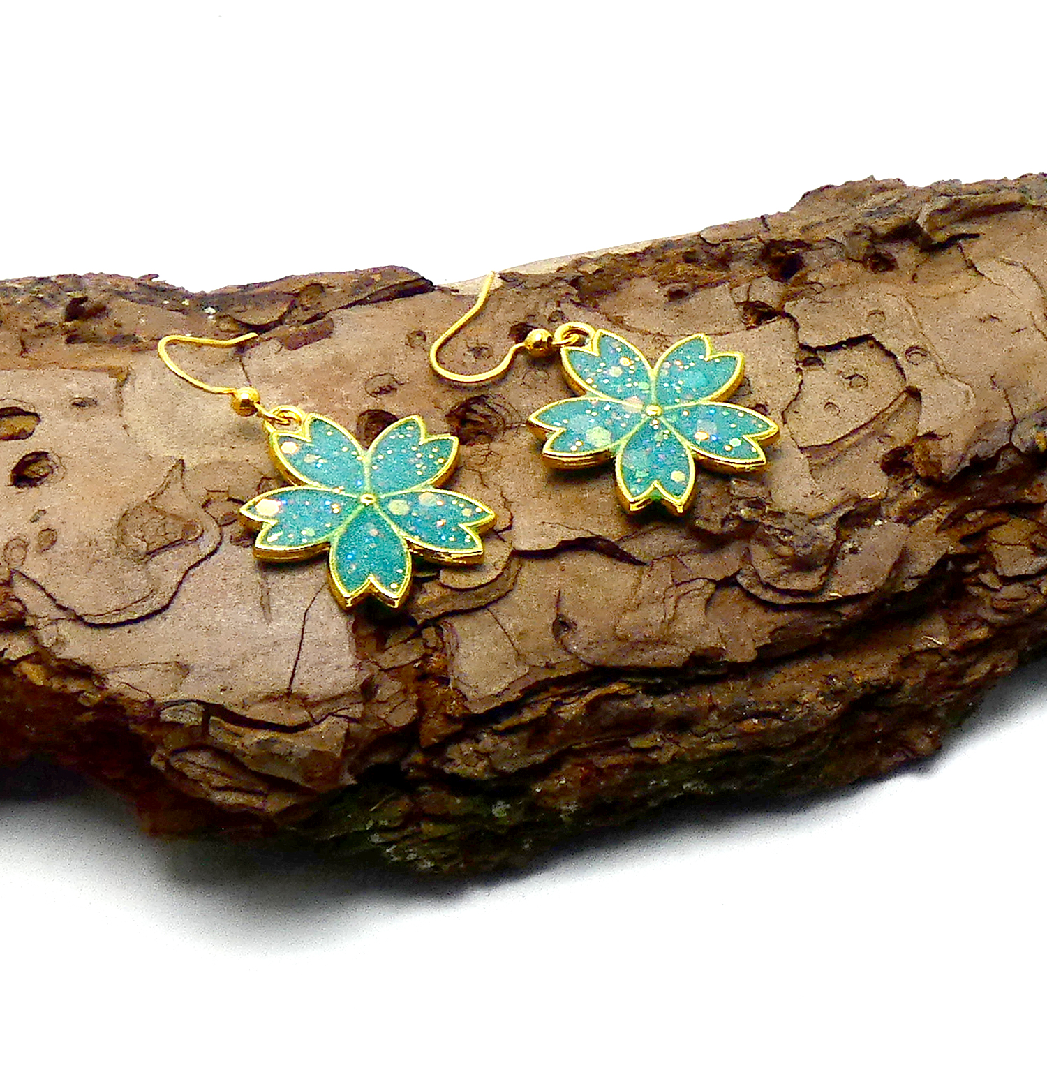 Goudkleurige Bloemen Oorbellen met Cyaan en Glitters